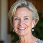 Portrait of Sarah Miller, a calm and insightful mental wellness coach.